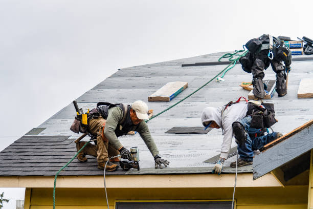 Professional Roofing technician working in Fairview, NY